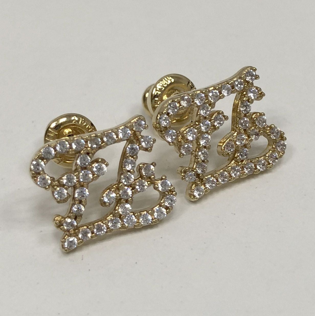 FENDI□カーリグラフィ ピアス 8AH266 ラインストーン ゴールド FFロゴ